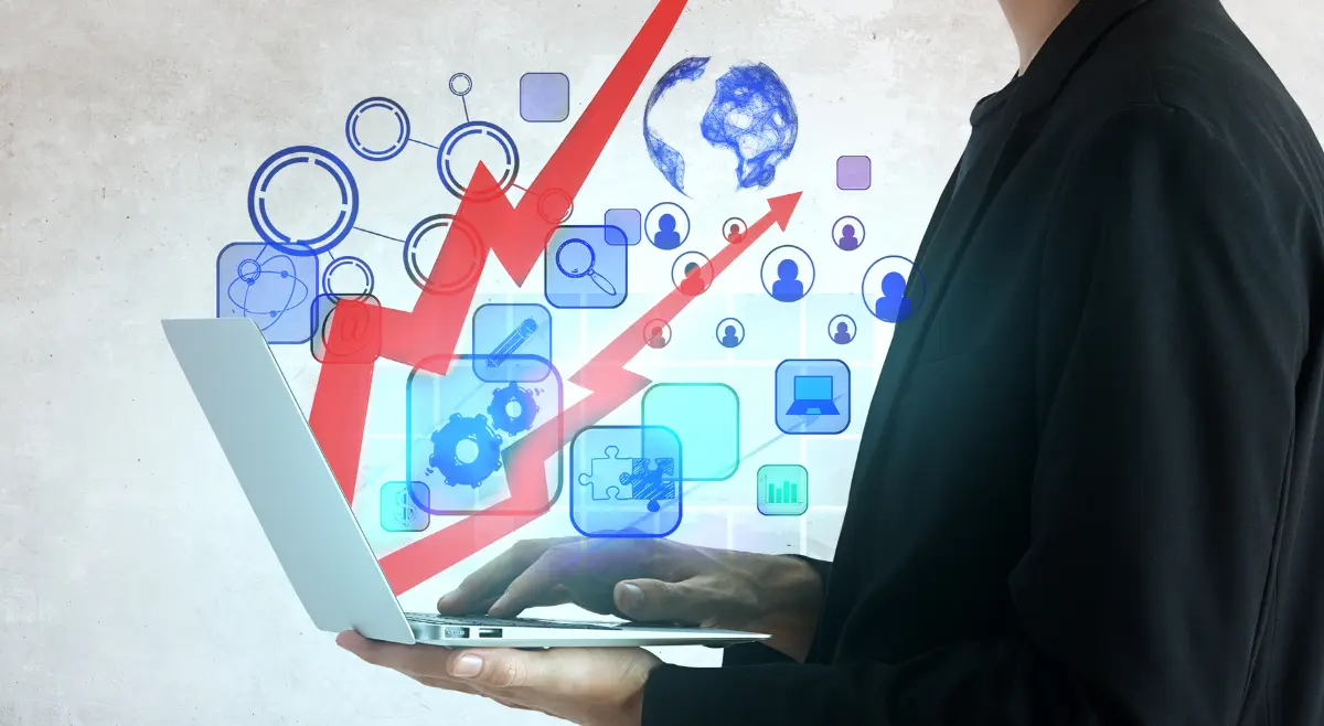 Entrepreneur testing a business idea on a whiteboard with charts and sticky notes